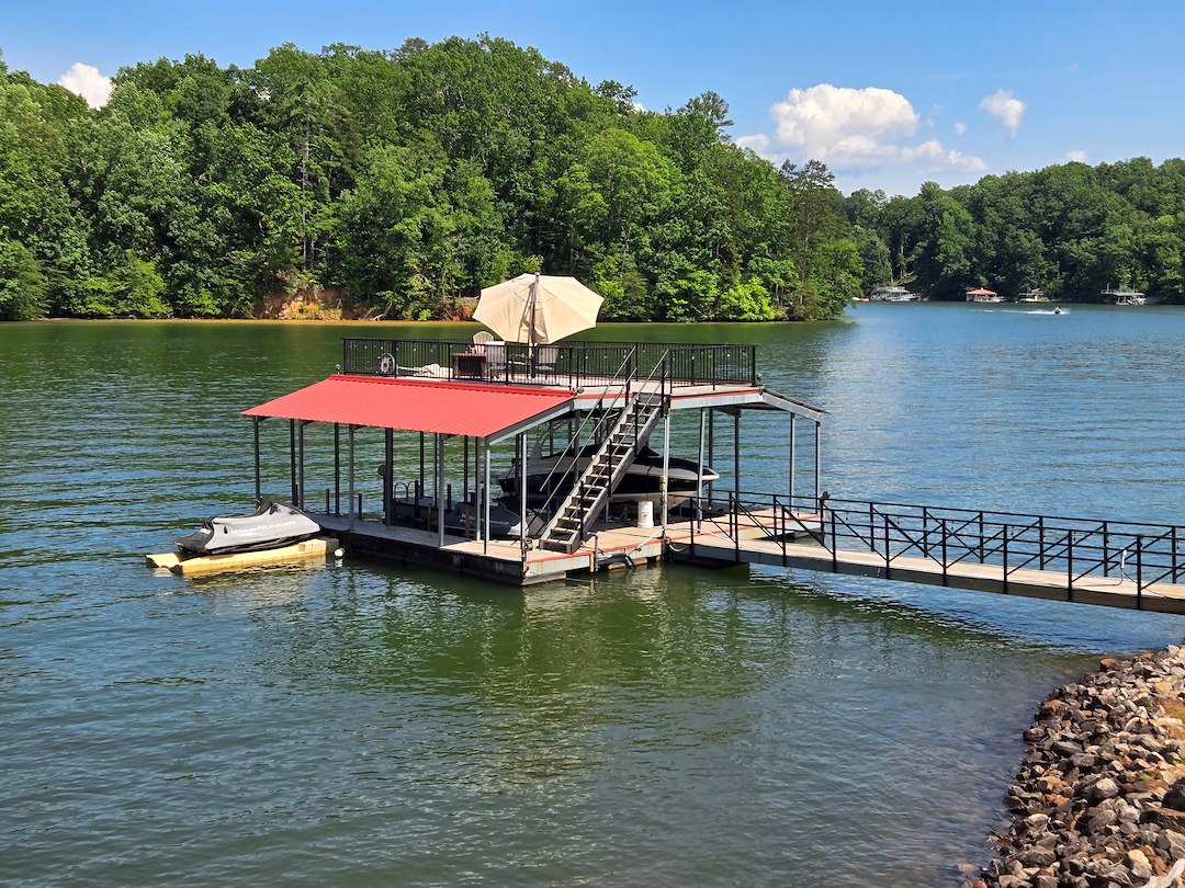 OUR BOAT DOCK CLEANING SERVICE IN CUMMING, GA, LEFT THIS DOCK SPARKLING CLEAN FOR THE JULY 4TH HOLIDAY
