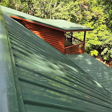 OUR-METAL-ROOF-CLEANING-SERVICE-RESTORED-THIS-ROOF-IN-DAHLONEGA-GA 3